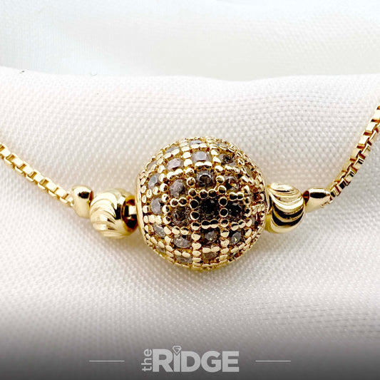 Crystal-Encrusted Gold Ball Charm Bracelet