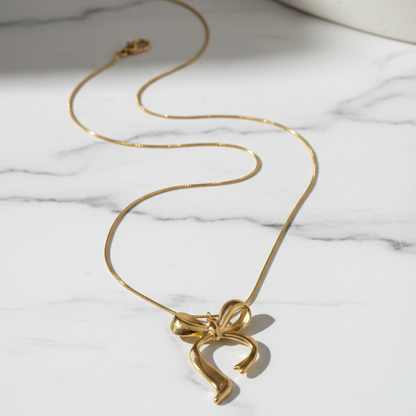 Golden Bow Pendant Necklace