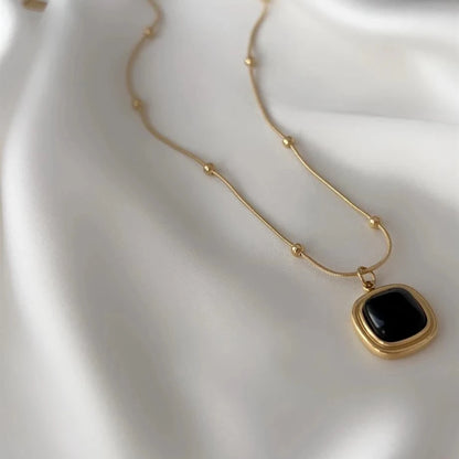 Midnight Muse Gold Pendant